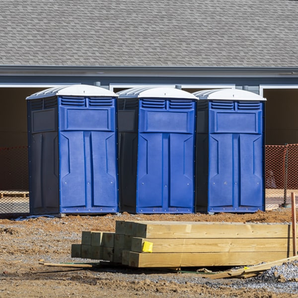 what is the cost difference between standard and deluxe portable toilet rentals in Vaughan